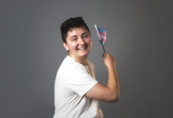 Trans Man Holding Trans Pride Flag