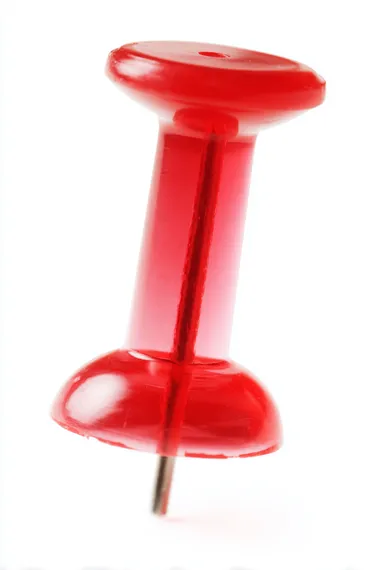Translucent Red Push Pin Isolated on White Background Translucent Red Push Pin Isolated on White Background