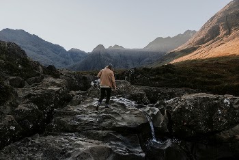 Travel background, man in rugged | Free Photo - rawpixel