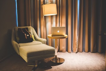 Traveler Hotel Room and Laptop