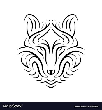 tribal tattoo of a wolfs head