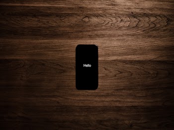 Turned on Black Iphone 7 Displaying Hello