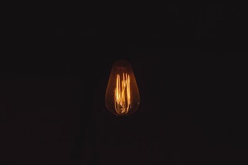 turned-on Edison bulb