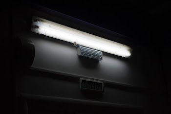 turned on fluorescent lamp