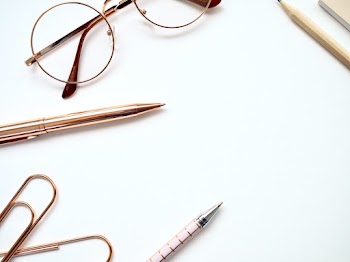 Twist Pen Beside Eyeglasses