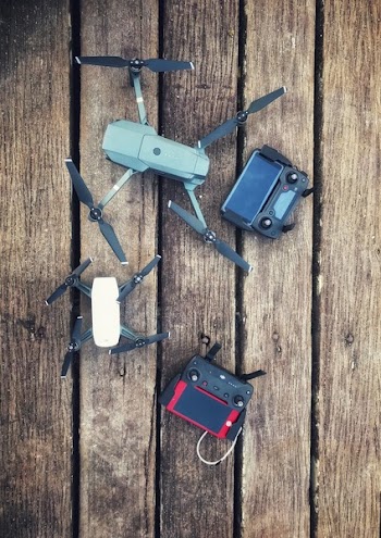 Two Assorted Quadcopter Drones With Controllers