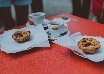 Two Baked Pastries in Plate on Table