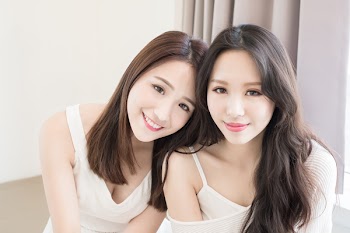 two beauty woman smile to you in the home