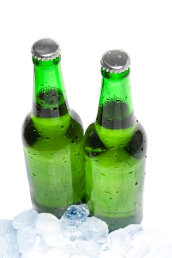 two beer bottles in the ice