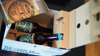 Two Black Labeled Bottles in Box