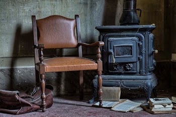 two black leather padded chairs
