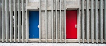 two blue and red door closed during daytime
