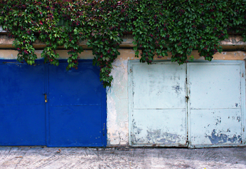 Two Blue Metal Closed Gates