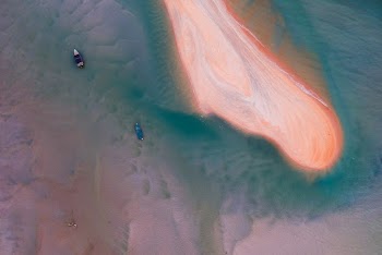 Two Boats on Body of Water