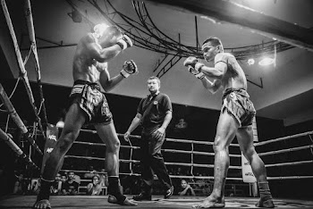 Two Boxers in a Boxing Ring