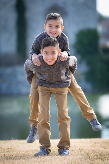Two Boy Smiling Outdoors