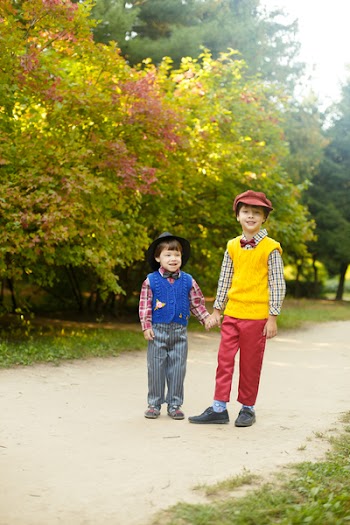 Two Boys Standing on Pathway