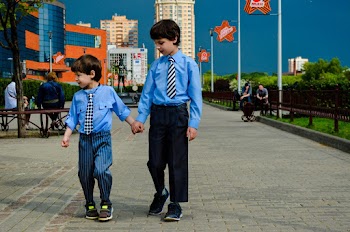 Two Boys Walking on Park