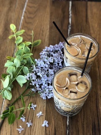 Two Brown Liquid on Glass With Ice