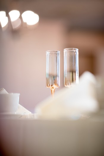 Two Champagne Glasses on Table
