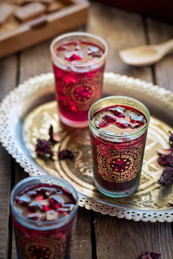 Two Clear Drinking Glasses With Filled Red Liquids