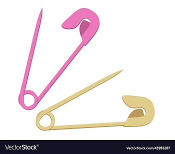 two colored opened safety pins golden and pink