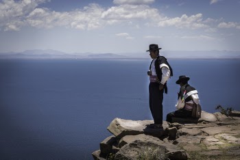 Two Cowboys on Cliff