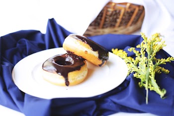 Two Donuts With Chocolate Syrup