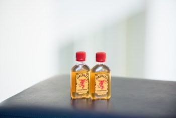 Two Fire Ball Bottles on Table Top