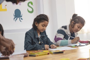 Two Girls Doing School Works