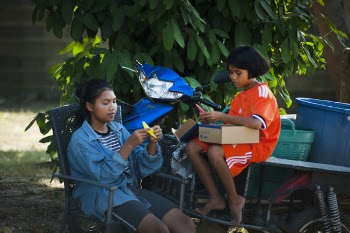 Two Girls Doning Hand Crafts