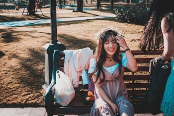 Two Girls Having Fun At The Park