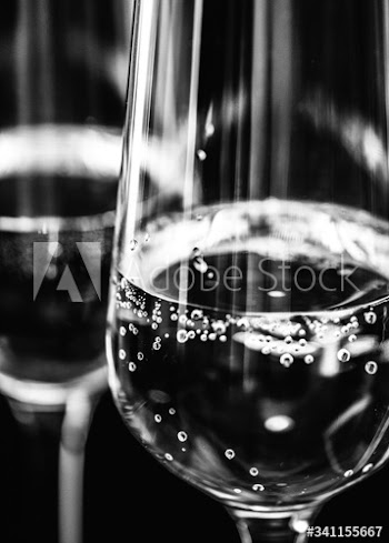 Two glasses of sparkling wine macro photography