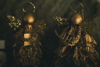 Two Gold-colored Christmas Decorations