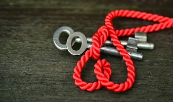 Two Gray Skeleton Keys on Gray Surface