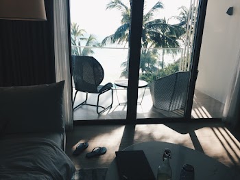 Two Grey Chairs Beside Coffee Table