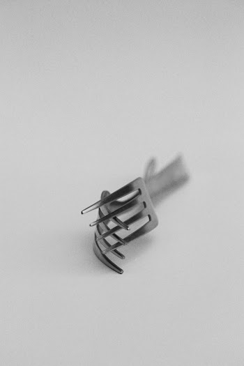 Two Grey Stainless Steel Forks