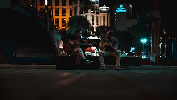 Two Guitar Players at a Park