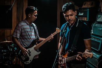 Two Guitar Players Performing