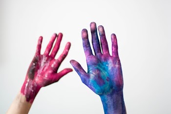 Two Hand Filled With Paint