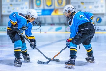 Two Hockey Players on Rink
