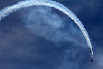 two jet fighters doing maneuver during daytime