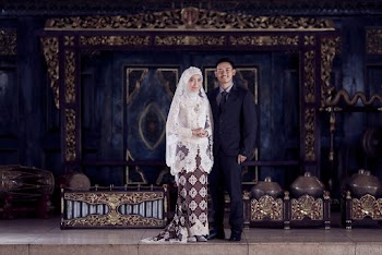 Two Man and Woman Standing Beside Each Other