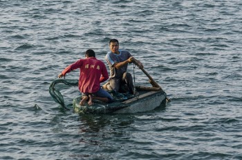 Two Man Riding Boat Photography