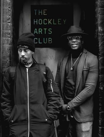 Two Man Standing on Grayscale Photography