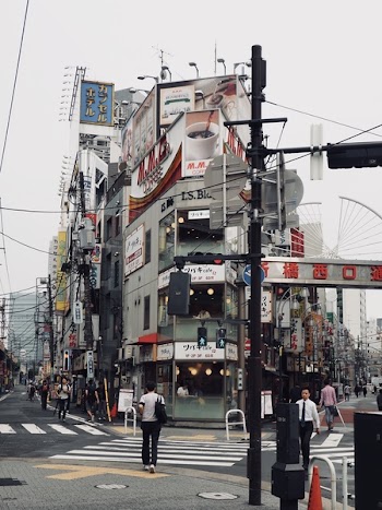 Two Men Crossing Pedestrian Lane