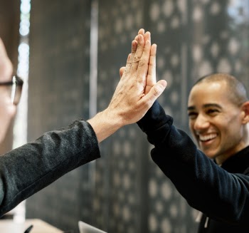 Two Men Doing a High-five
