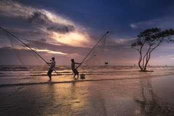 Two Men Holding Nets