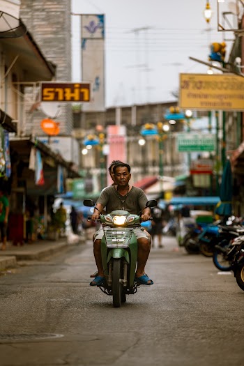 Two Men on Motor Scooter