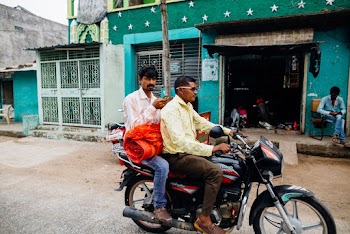 Two Men Riding Motorcycle